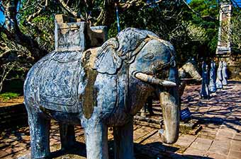 Stone elephant at royal tomb in Hue, Vietnam